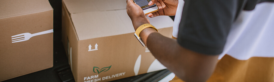 BW Website Delivery Order 20200326|Delivery Order 20200326|African Delivery Man Checking Delivery Address In The Car Trunk ||